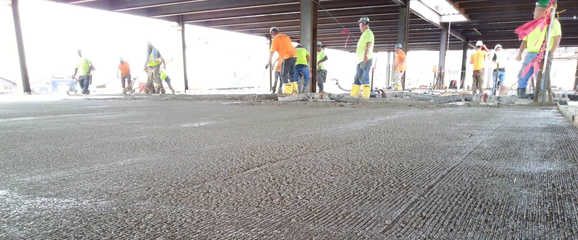 How is a concrete surface prepared?