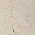 What are the three causes of cracking in concrete?