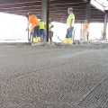 How is a concrete surface prepared?