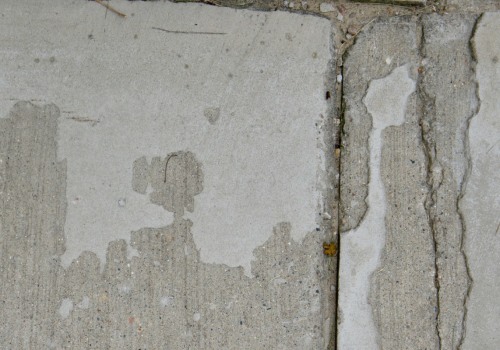 How can we prevent the flaking of concrete?